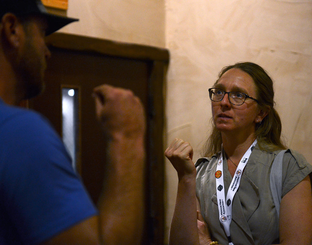 Anndrea Hermann listens to a mid-Missouri farmer's questions after her speech